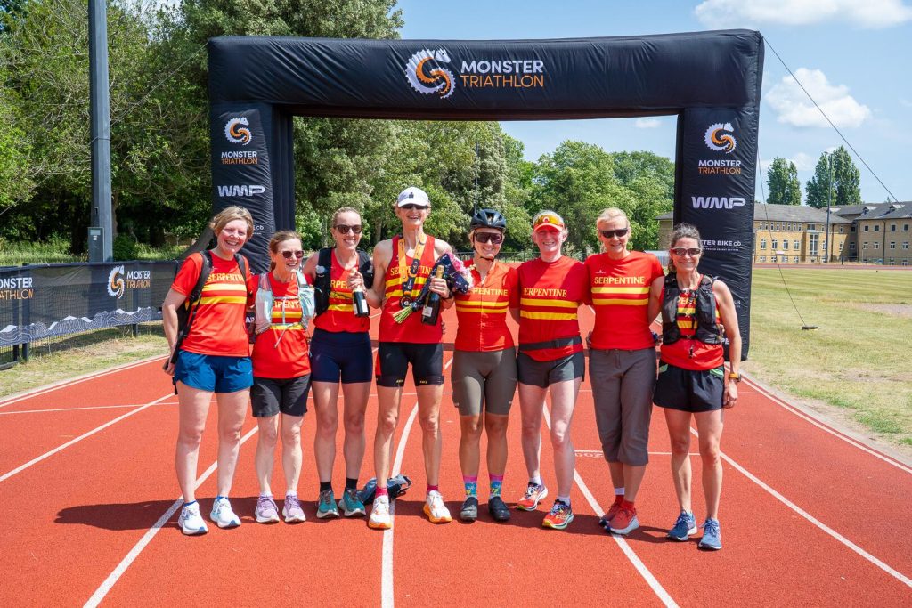 A group of finishers at the finish arch