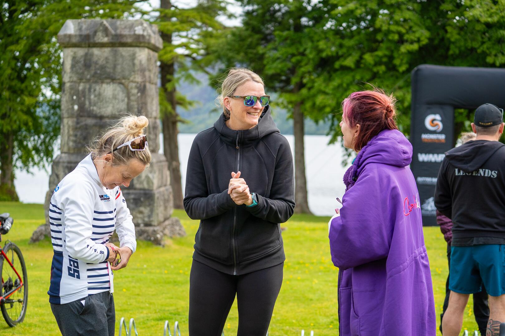 Participants talking together before the start of the week